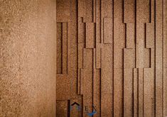 an image of a wall made out of bricks and concrete blocks with a clock on it