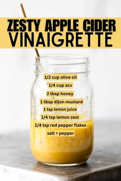 a mason jar filled with homemade zesty apple cider vinaigrette recipe