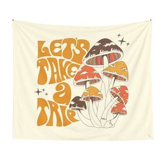 an orange and white tapestry with mushrooms on it that says let's take a bite