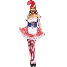 a woman in a red and white dress is posing for the camera while wearing an elf costume