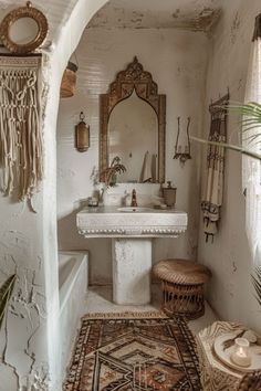 a bathroom with a sink, mirror and rug