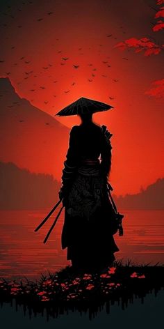 the silhouette of a person with an umbrella over their head standing in front of a red sky