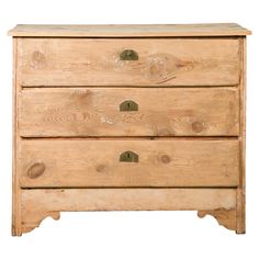 a wooden dresser with three drawers on one side and two knobs on the other