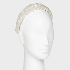 Whether you're attending a wedding, a soirée, or a glamorous night out, the White Pearl Headband effortlessly complements a myriad of styles. Its versatility knows no bounds – pair it with a flowing evening gown for a regal look or use it to add a touch of sophistication to your casual attire. Beaded Fitted Headpieces For Party, Elegant White Headband For Evening, Elegant White Evening Headband, Elegant Fitted Cream Hair Accessories, Pearl White Bridal Accessories For Party, Elegant Cream Headband For Party, Silver Adjustable Evening Headpieces, Glamorous Silver Headband For Party, Adjustable Hair Accessories With Structured Crown For Wedding