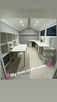 an empty room with desks and shelves in it that says my new craft room