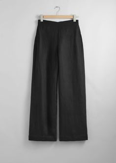 Relaxed high-waist trousers cut from a breezy material. Finished with a clean waistline.• Duo welt pockets• Zipper at the back• Length of inseam:80cm / 31.5" (EU 36 / UK 8 / US 4) Chic Linen Pull-on Pants, Chic Linen Bottoms For Work, Chic Linen Workwear Bottoms, Versatile Bottoms With Wide Waistband For Work, Versatile Workwear Bottoms With Wide Waistband, Chic Ankle-length Pull-on Style Bottoms, Chic Ankle-length Pull-on Bottoms, Chic Ankle-length Pull-on Pants, Chic Linen Bottoms For Business Casual