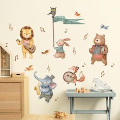 wall decals with animals and musical instruments in the nursery room, including an elephant holding a microphone