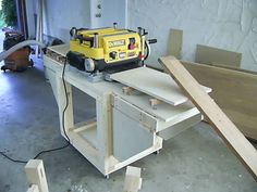 a workbench is being worked on in a garage