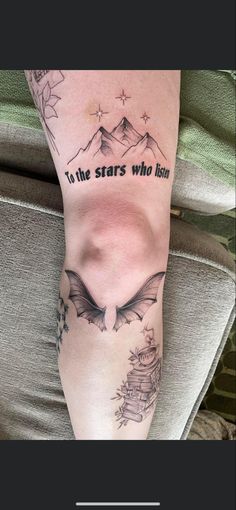 a woman's leg with tattoos on it and the words to the stars who listen