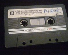 an old black and white cassette with the words cold crush brothers on it's side