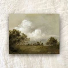 an image of a painting with clouds in the sky and trees on the other side