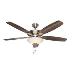 a ceiling fan with two wooden blades and a light on the bottom one is turned on