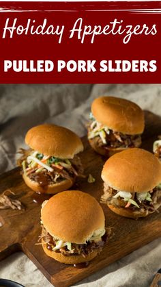 four pulled pork sliders on a cutting board with text overlay that reads holiday appetizers pulled pork sliders