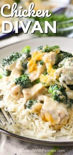 a white plate topped with chicken and broccoli covered in gravy on top of rice