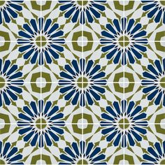 a blue and green tile pattern with an intricate design on the bottom half of it