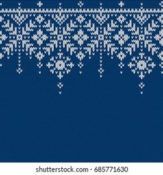 a blue and white knitted background with snowflakes on the edges, as well as an ornament in the middle