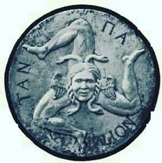 a coin with an image of two women on the front and one woman in the back