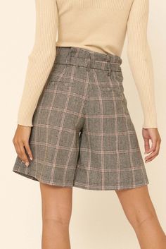 Wool-blend plaid shorts. Paperbag waist. Removable tie belt. Belt loops. Concealed front zipper. Hip pockets. Satin lining. Wide leg Thigh length. Relaxed fit. 95% Polyester, 5% Wool. Imported. Designed in Los Angeles, CA. Model wears size S. Fall Season Belted Short Bottoms, Belted Short Bottoms For Workwear, Fall Workwear Shorts With Short Inseam, Workwear Shorts For Fall With Short Inseam, Plaid Knee-length Bottoms For Fall, Fall Workwear High-waisted Shorts, Knee-length Plaid Bottoms For Fall, Fall High Waist Shorts With Belt Loops, Belted High-waisted Shorts For Work