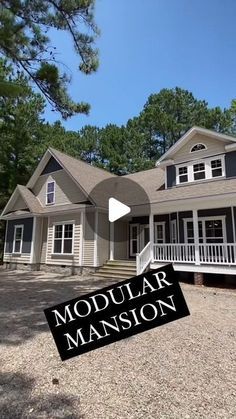 this is an image of a house with the words modular mansion in front of it