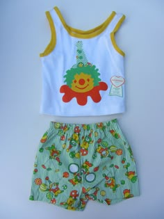 Wonderful unique babys vest top with contrast shorts with a clown motif. Sized as age 3 but as vintage aim for a little smaller. New old stock from the 70's Clown Swimsuit, A Clown, Funky Outfits, Clothing Sets, Unique Baby, Boys Clothing, Age 3, Vest Top