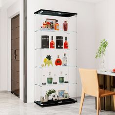 a room with a table, chairs and shelves filled with liquor bottles on the wall