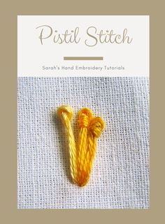 a yellow piece of yarn sitting on top of a white cloth covered in text that reads, pistil stitch sarrl's hand embroidery