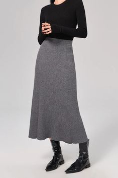 Sophisticated A-line Skirt: Resilient Washable Wool-blend Mastery Our A-line skirt, knit from a blend of washable wool, captures elegance in its purest form. The mid-high waist design elongates the silhouette, while the soft and resilient fabric ensures comfort all day. Style #: WKAI207 Grey Knit Skirt, Fall Midi Skirt, Warm Skirt, Black Knit Skirt, Long Wool Skirt, Warm Skirts, Midi Skirt Fall, Skirt Knit, Tank Top Skirt