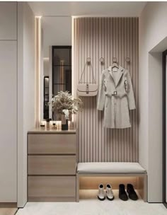 a closet with shoes, coat and purses