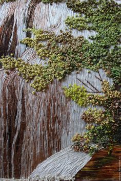 a painting of water flowing over rocks and trees