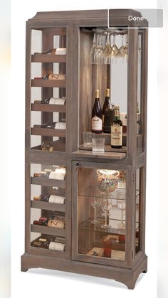 a wooden cabinet with wine glasses and bottles in it