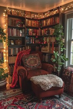 a living room filled with lots of furniture and bookshelves covered in christmas lights