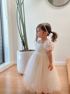 A classic flower girl dress reminiscent of all the disney princess dresses of your childhood Harper is the sweetest dress for your girls whether it be for a flower girl, garden tea party or family occasion. 💖 With gorgeous puffed sleeves, soft lace in the bodice, and a glorious long tulle skirt this is the dreamiest dress for your girls special day. The tulle is the most soft and floaty tulle you can imagine. Your girls will truly feel like a princess wearing this beautiful dress. Girls of all Wedding Thrifts, Flower Girl Outfit Ideas, Classic Flower Girl Dress, Toddler Wedding Dress, Baby Wedding Outfit, Kids Wedding Outfits, Flower Girl Outfits, Long Tulle Skirt, Flower Girl Outfit