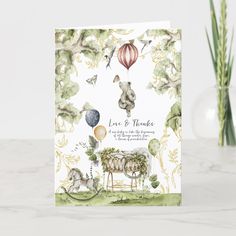 a card with an illustration of animals and hot air balloons