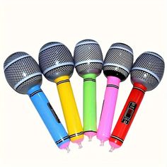 five colorful microphones lined up in a row