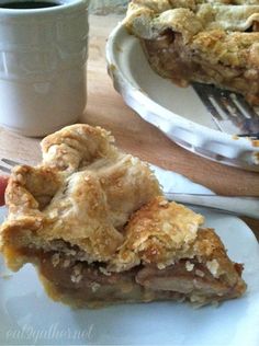 a piece of pie sitting on top of a white plate