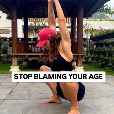 a woman doing yoga in front of a gazebo with the words stop blaming your age