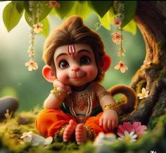 an adorable little monkey sitting on the ground in front of a tree with lots of flowers