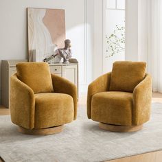 two yellow chairs sitting on top of a rug