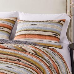 the comforter is made up with multicolored stripes