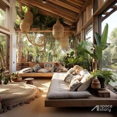 a living room filled with lots of plants and furniture