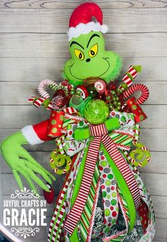 the grinch christmas decoration is on display