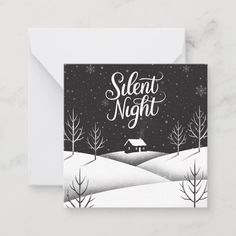 a black and white christmas card with the words silent night written in cursive writing