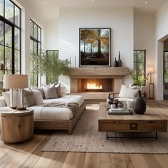 a living room filled with furniture and a fire place in the middle of a room