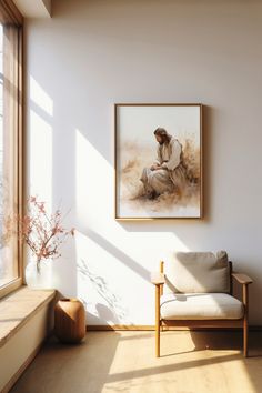 a painting hanging on the wall above a couch