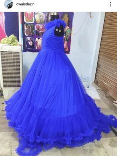 a blue dress that has been made to look like it is in the shape of a monster