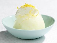 a small bowl filled with ice cream on top of a table