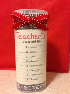 a teacher's first aid kit with a red bow