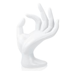 a white hand statue on a white background