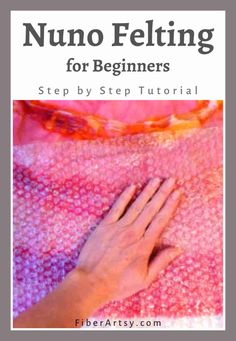 a woman's hand on top of a pink blanket with the words nuno felting for beginners