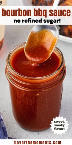 a spoon full of bbq sauce with the words bourbon bbq sauce no refried sugar